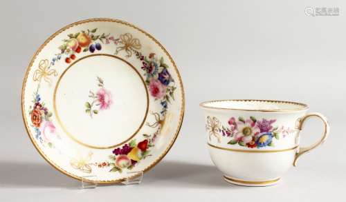 AN EARLY 19TH CENTURY BREAKFAST CUP AND SAUCER with sprays of flowers and gold ribbons, printed with