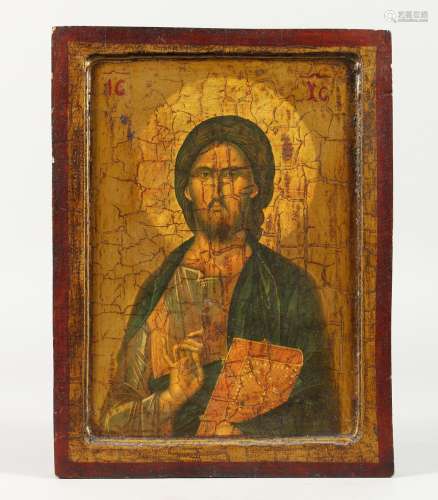 A RUSSIAN ICON on wood. 11ins x 8ins.
