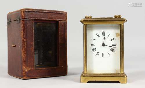 A GOOD FRENCH BRASS CARRIAGE CLOCK. 4.5ins, in a leather case.
