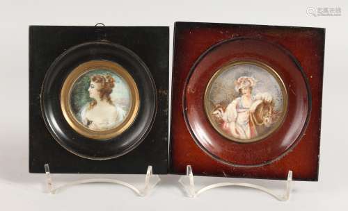 TWO CIRCULAR PORTRAIT MINIATURES OF YOUNG LADIES in wooden frames. 2ins x 2.5ins diameter. Signed.
