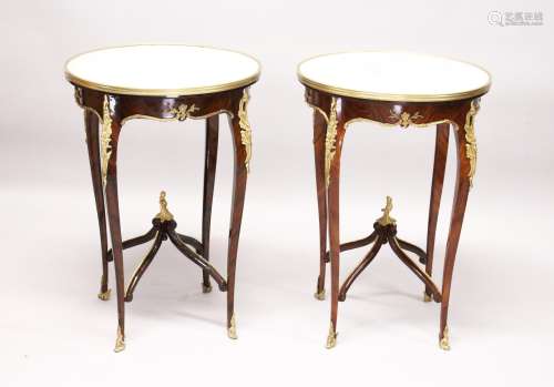 A GOOD PAIR OF LOUIS XVITH DESIGN FRENCH CIRCULAR MARBLE TOP TABLE with ormolu mounts, curving