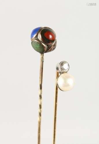 A DIAMOND AND PEARL STICK PIN and an ENAMEL STICK PIN.