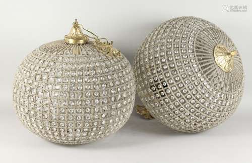 A PAIR OF LARGE BALL SHAPED CUT GLASS AND BRASS CHANDELIERS. 22ins high.