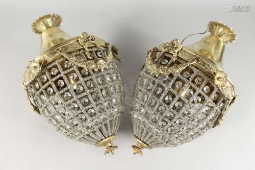 A PAIR OF PINEAPPLE SHAPE CUT GLASS AND BRASS HALL LIGHTS. 16ins high.