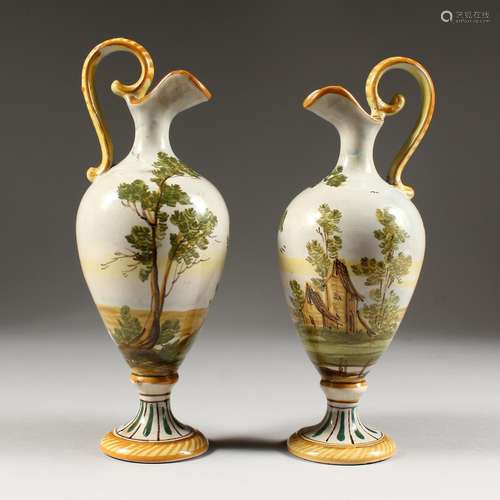 A PAIR OF CASTELLI POTTERY JUGS. 8ins high.