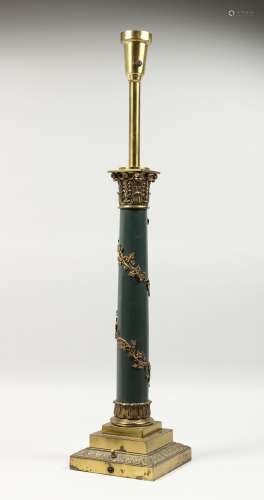 A CLASSICAL STYLE COLUMN SHAPED TABLE LAMP. 33ins high.