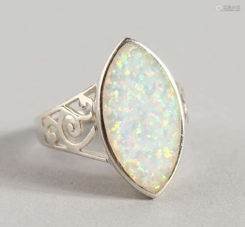 A SILVER AND OPAL RING.