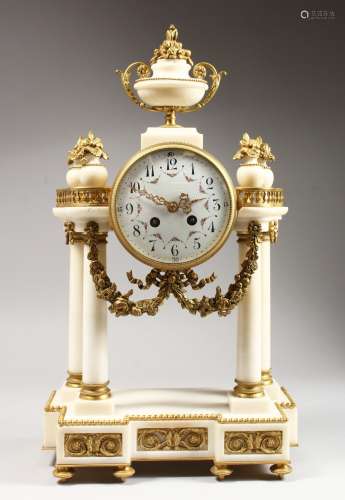 A VERY GOOD LOUIS XVI WHITE MARBLE AND ORMOLU DRUM SHAPED MANTLE CLOCK, with 4.5ins enamel dial,