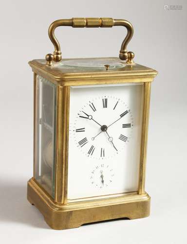 A 19TH CENTURY FRENCH BRASS ALARM REPEAT CARRIAGE CLOCK. 5ins high.