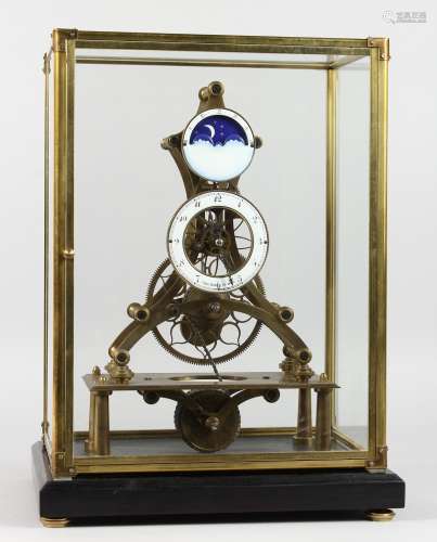 A GOOD, MODERN SKELETON CLOCK WITH MOON PHASE MOVEMENT, in a glass display case. 17.5ins high.