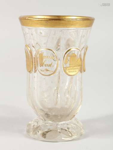 A BOHEMIAN GILDED GLASS BEAKER. 4.75ins high.