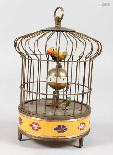 A NOVELTY BIRD CAGE CLOCK. 8ins high.