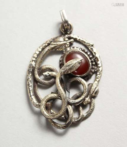 A SILVER ENTWINED SNAKES PENDANT.