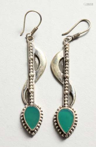 A PAIR OF SILVER AND JADE EARRINGS.