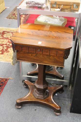 A GOOD REGENCY ROSEWOOD TEAPOY, with rising top, the interior with two lidded compartments and a