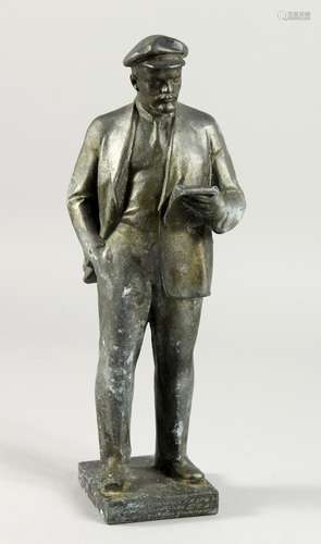 A RUSSIAN METAL STANDING FIGURE OF LENIN reading a book, inscribed on side of base. 14ins high.