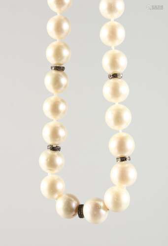 A PEARL NECKLACE, INTERSPERSED WITH SMALL DIAMONDS, with an 18ct white gold clasp. 17ins long.