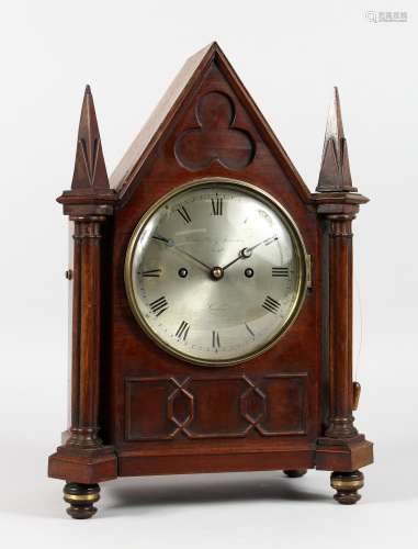A REGENCY MAHOGANY GOTHIC DESIGN BRACKET CLOCK by GRIMALDE & JOHNSON, STRAND, with silver dial and