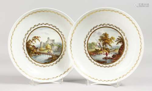 A PAIR OF 18TH CENTURY DERBY PLATES, painted with scenes entitled 'River Trent' and 'Italy', paper