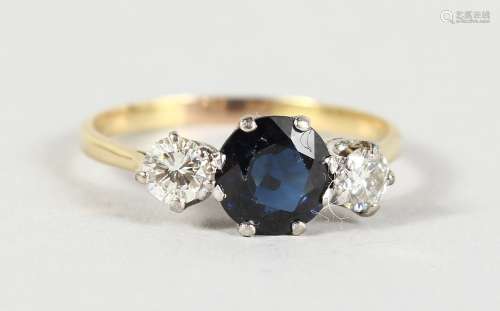 A GOOD 18CT GOLD, SAPPHIRE AND DIAMOND RING.