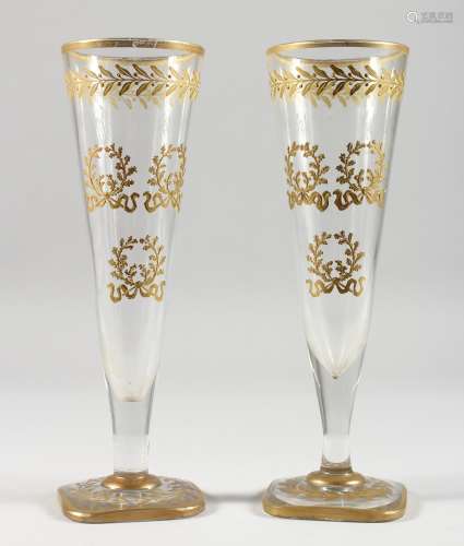 A GOOD PAIR OF BACCARAT FLUTED GLASSES.