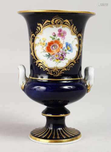 A GOOD 19TH CENTURY MEISSEN RICH BLUE URN SHAPED VASE, painted with a panel of flowers. Cross swords