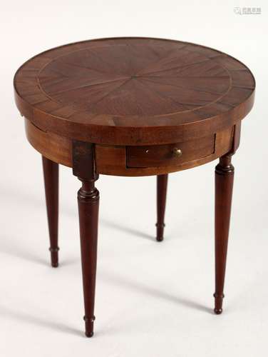 A MINIATURE APPRENTICE PIECE CIRCULAR MAHOGANY TABLE on four turned legs. 6ins diameter.