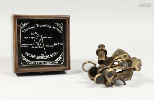 A SMALL REPRODUCTION SEXTANT, boxed. Box 4.5ins wide.