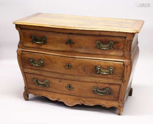 A GOOD 18TH CENTURY FRENCH WALNUT THREE DRAWER COMMODE, of bombe form, with serpentine front, carved