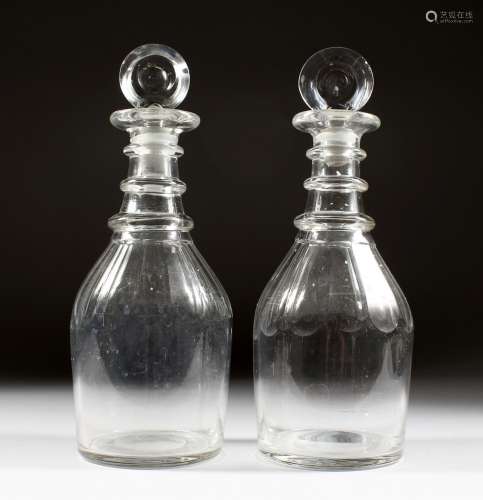 A GOOD PAIR OF GEORGIAN DECANTERS AND STOPPERS.