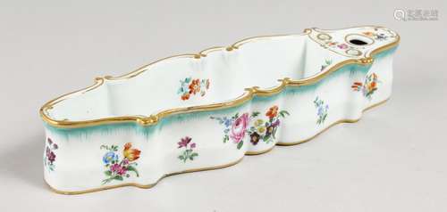 A RARE MEISSEN LONG INKWELL painted with flowers. Cross swords mark in blue. 10.75ins long.