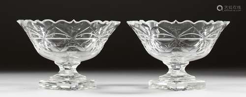 A GOOD PAIR OF CUT GLASS SWEETMEAT DISHES on triangular bases.