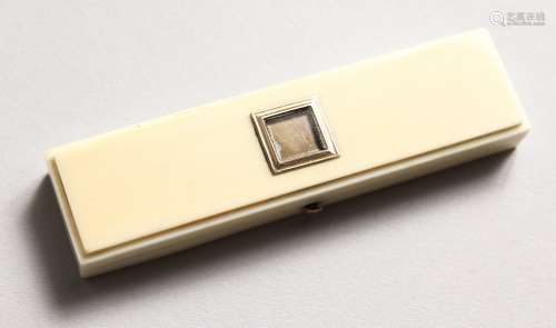 A GEORGE III LONG IVORY TOOTHPICK CASE, the top with square panel, mirror inside with gilt toothpick