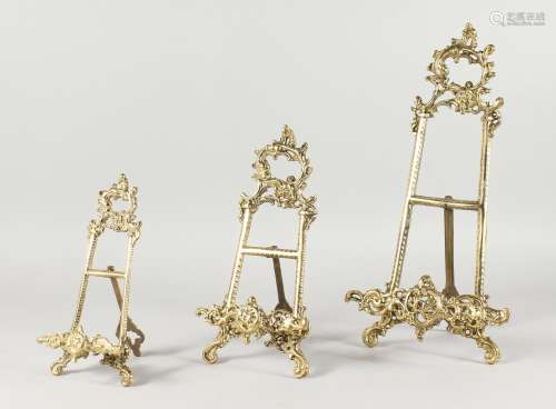 THREE DECORATIVE BRONZE EASELS. 8.5ins, 11ins and 16ins high.