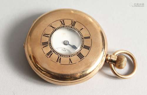 A GENTLMAN'S 9CT GOLD HALF HUNTER by J. W. BENSON, LONDON.