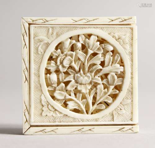 A CANTON SQUARE, CARVED AND PIERCED PUZZLE, four pieces in two layers. 2ins square.