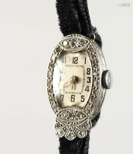 A LADIES' PLATINUM AND DIAMOND COCKTAIL WATCH.