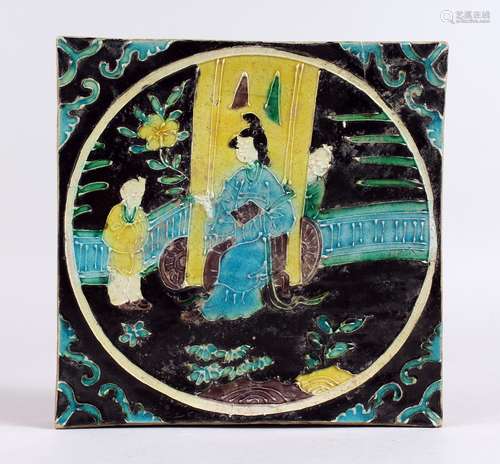 A GOOD ORIENTAL SQUARE TILE, enamel colours with figures. 7.5ins.