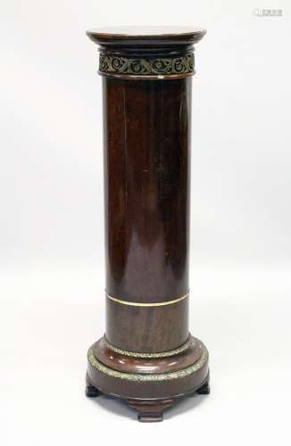 A MAHOGANY AND ORMOLU MOUNTED CIRCULAR COLUMN, EARLY/MID 20TH CENTURY, with a rotating top