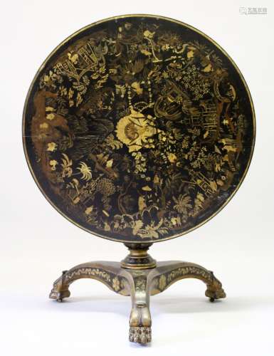 A VERY GOOD REGENCY BLACK LACQUER AND CHINOISERIE DECORATED CIRCULAR TILT TOP TABLE, the top