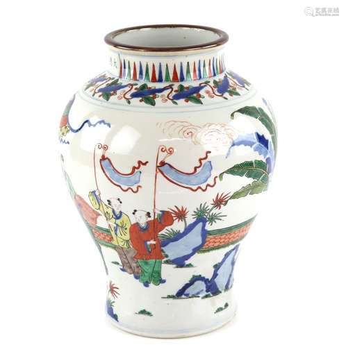 A wucai style vase with unglazed base; Wanli six-character mark but not of the period, about 33 cm