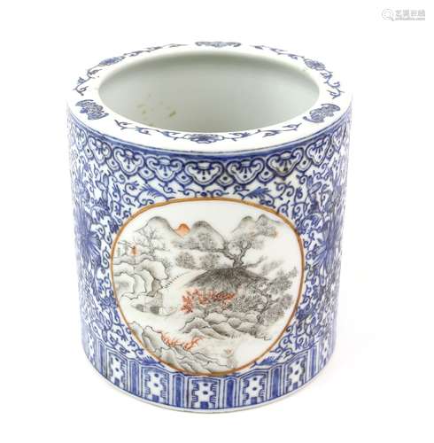 A blue decorated bitong of typical cylindrical form, decorated with panels in orange and en-