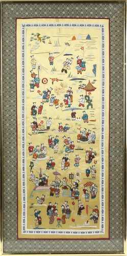 A framed Chinese textile of rectangular form, decorated with a multitude of boys playing at a