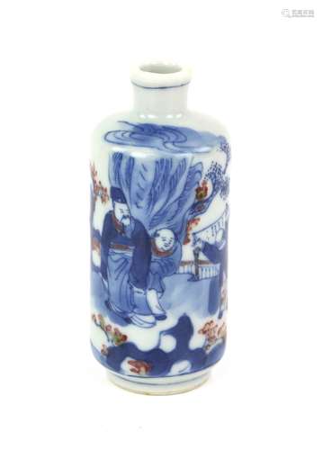 A Chinese snuff bottle of cylindrical form decorated in underglaze blue and yu li hung with a