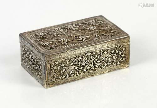A Chinese white metal box and hinged cover of rectangular form, decorated on the cover with horsemen