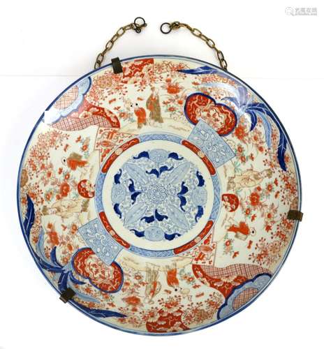 Large Japanese charger decorated in the Imari palette with figures, flower and foliage, 55.5cm