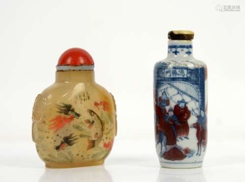 A Chinese Snuff bottle, decorated in underglaze blue and yu li hung, 7.5 cm high; together with