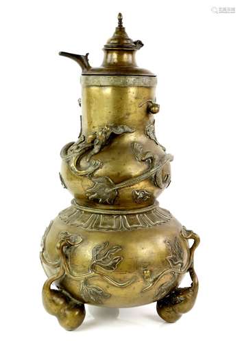 A Chinese metal alloy vase of double gourd form, decorated with a four-clawed dragon coiled around