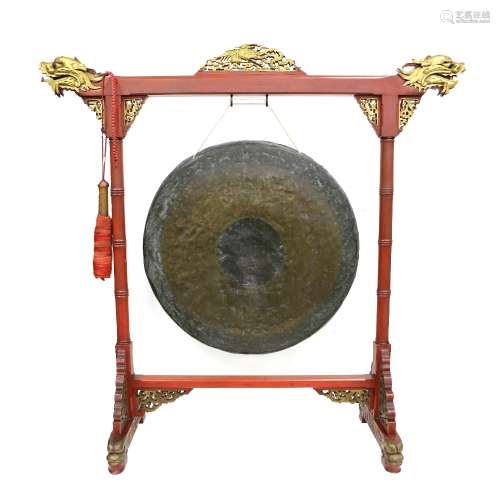 A large Chinese Gong on fitted stand; diameter of the gong about 70 cm; inscribed 'Chang men Zhong