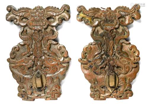 A PAIR OF CARVED WOOD SCONCES, JAVA, CIRCA 18TH CENTURY